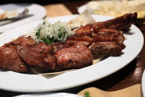istock Shish kebab with onion rings 475734182