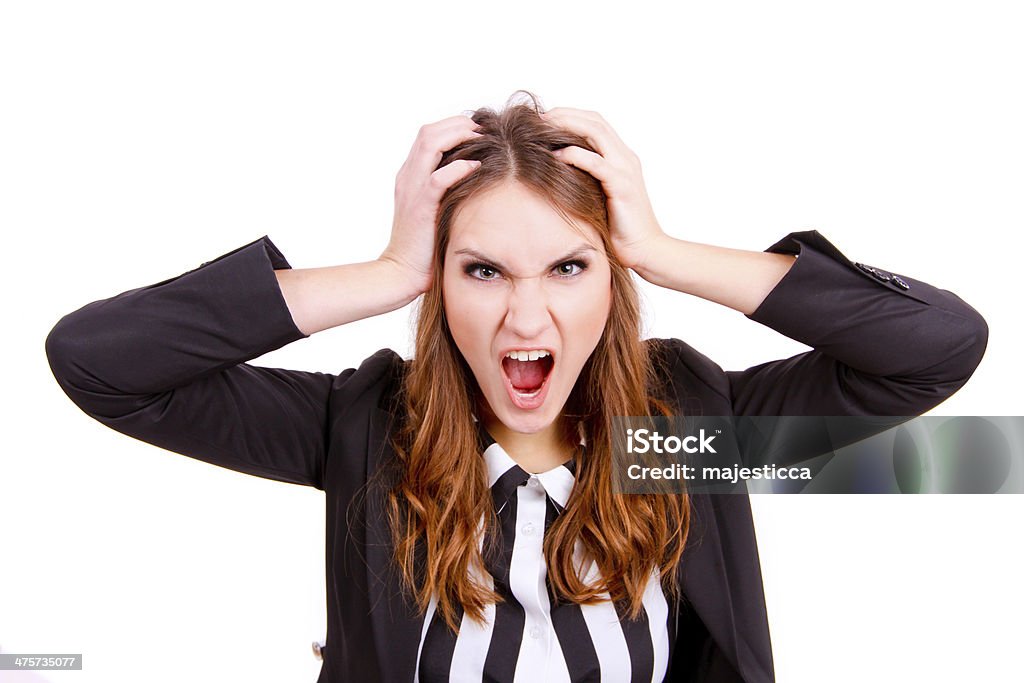 Frustrated and stressed young businesswoman in suit Frustrated and stressed young businesswoman in suit isolated Adult Stock Photo
