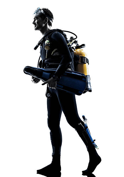istock man scuba diver diving silhouette isolated 475745202
