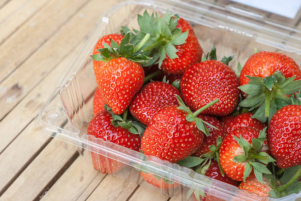 istock Fresh ripe strawberry in box. 475747528