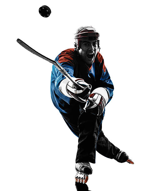 silhouette de homme joueur de hockey sur glace - hockey sur patins photos et images de collection