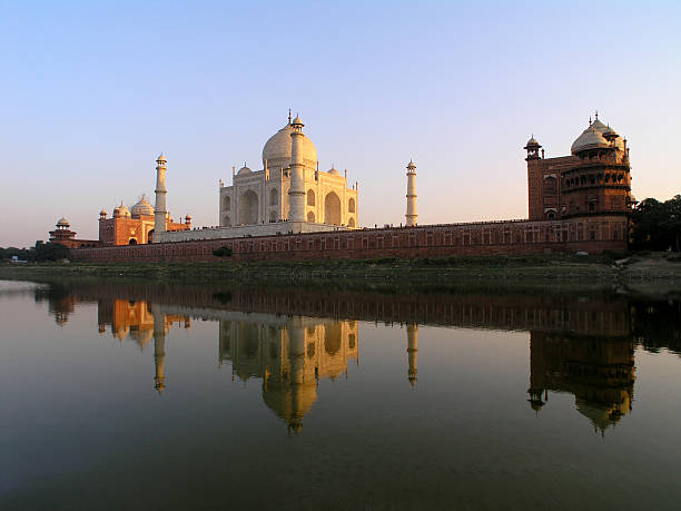 istock Taj Mahal sunset with reflections. from lake side. 475751506