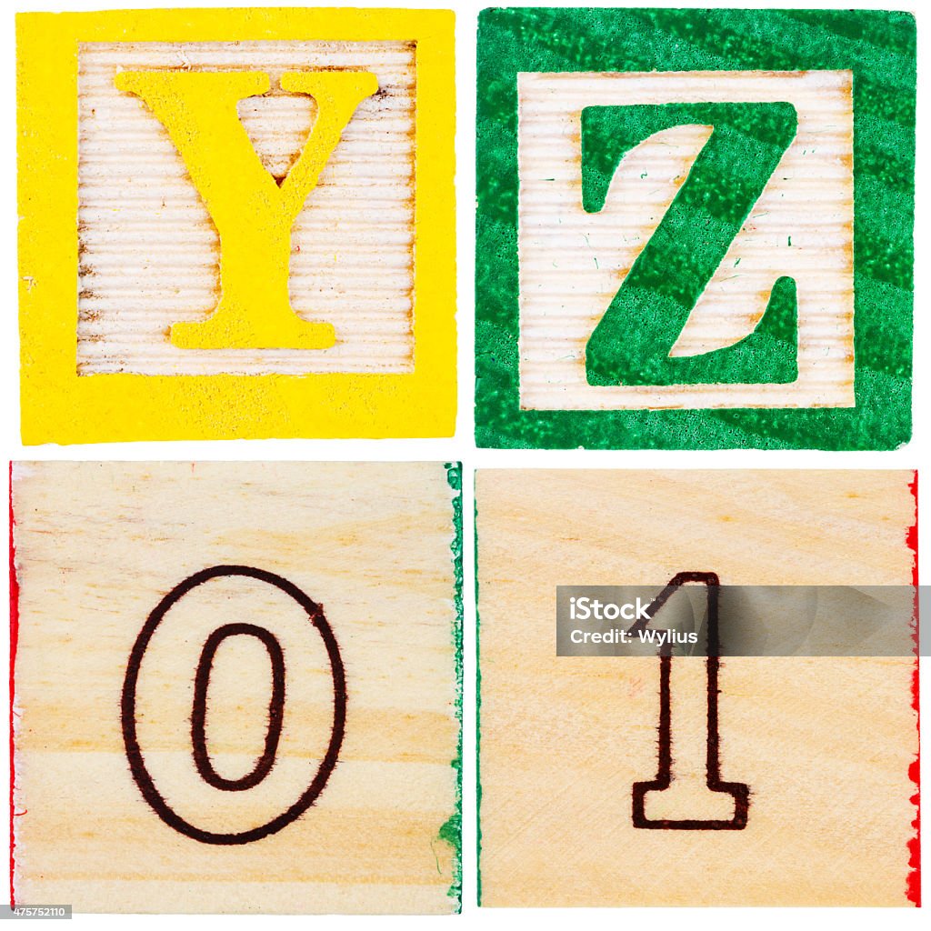 Wooden toy blocks with letters and numbers Wooden toy blocks with letters and numbers isolated on white background 2015 Stock Photo