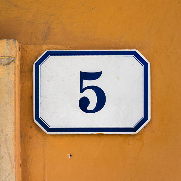 House number 5 ceramic house number five on a orange wall ceramic tile house numbers stock pictures, royalty-free photos & images