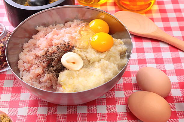 istock Minced fish with eggs in the bowl and spices 475754265