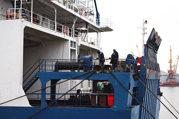 istock Industrial ship ropes on a pier 475755091
