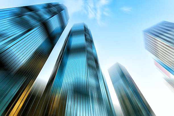istock low angle view of skyscrapers in blurred motion. 475756430
