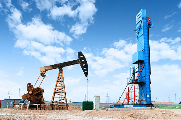 istock oil field and blue sky 475756710