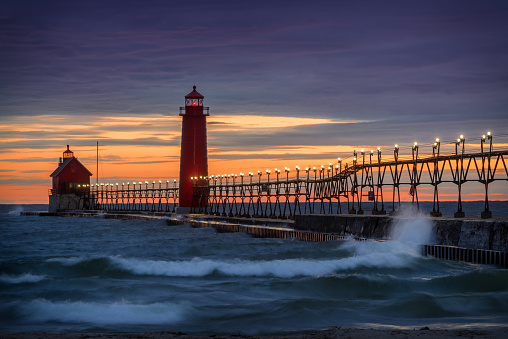 Grand Haven South Pierhead Inner Light with Entrance Light in background in Grand Haven State Park in Grand Haven, Michigan