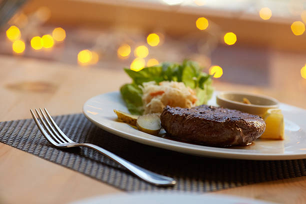istock steak with sauce and vegetables 475758586