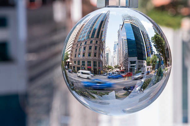 Crystal Ball with Reflection of Skyscrapers in CBD Singapore. stock photo