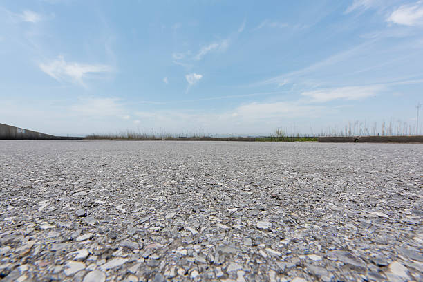 Road perspective from low angle Low angle pavement,shot at surface level low angle view stock pictures, royalty-free photos & images
