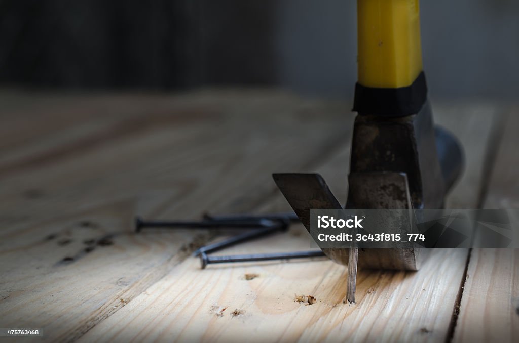 Hammer and nails on wood,claw hammer on a workbench 2015 Stock Photo