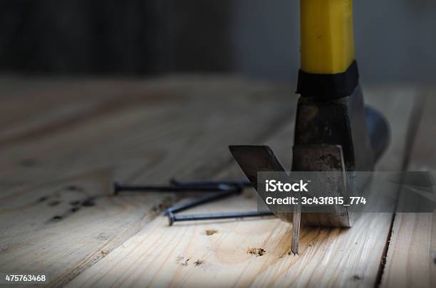 Hammer And Nails On Wood Claw Hammer On A Workbench Stock Photo - Download Image Now