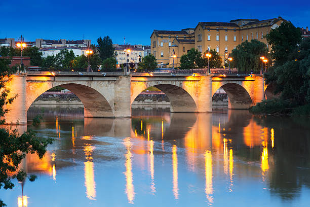 ancient stone bridge over Ebro  in evening. Logrono