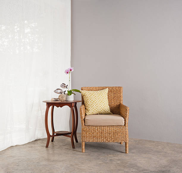 istock Rattan sofa chair in lounge setting 475767695