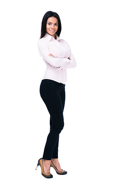 istock Smiling businesswoman standing with arms folded 475768260