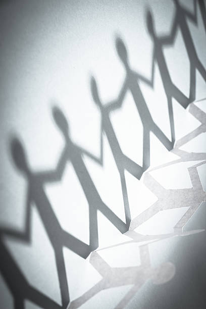 istock Group of people holding hands 475771594