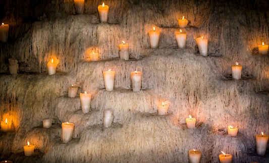 Wall full of candles and tonnes of wax