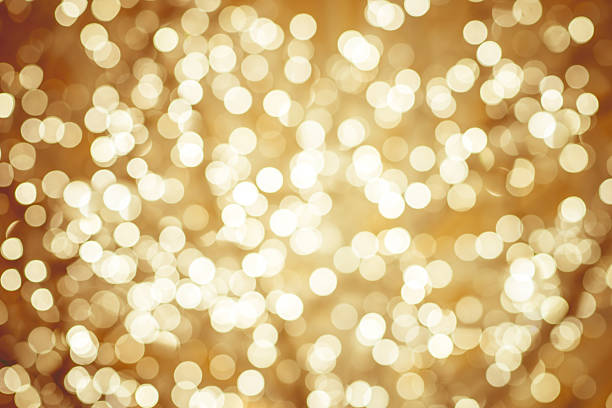 istock Golden background with natural bokeh defocused sparkling lights 475774004