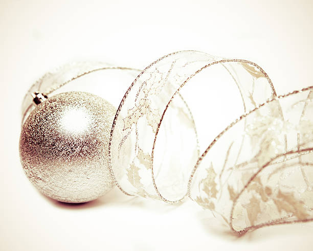 istock Beautiful silvery New Year's ball and elegant tinsel 475774416