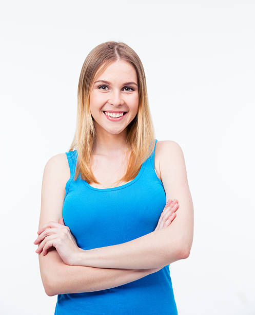 istock Casual woman standing with arms folded 475774780
