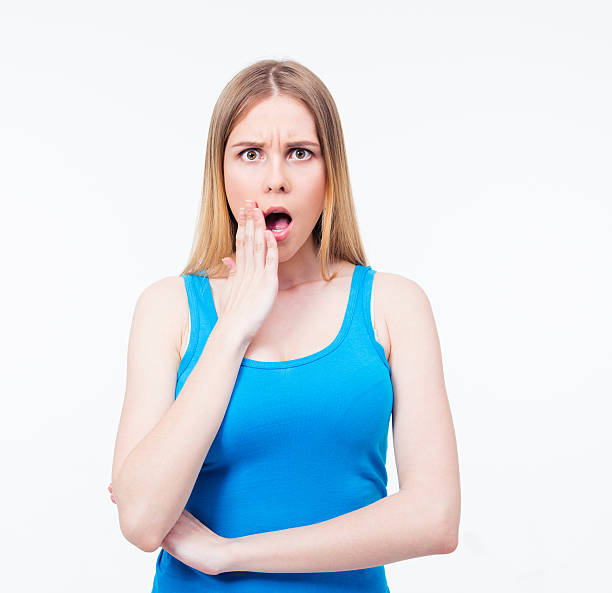 istock Amazed young woman looking at camera 475774782