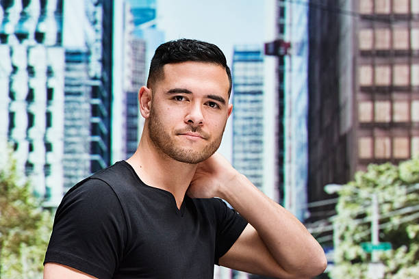 istock Casual man outdoors and looking at camera 475775050