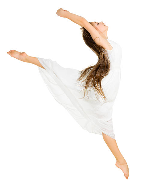 istock Young dancing girl in white dress 475775848