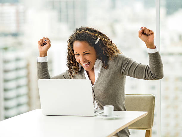 istock Successful African American businesswoman using computer in the office. 475775996