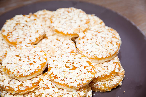 istock Apricot cookies on wooden table 475776140