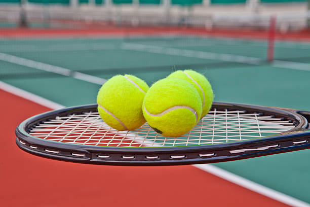 istock Tennis court with ball and racket 475776789