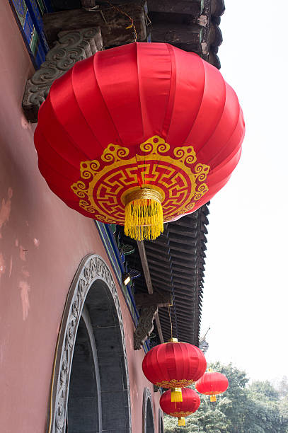 istock Red lanterns with Traditional Chinese building 475781153