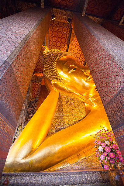 istock Buddha gold statue in Wat Pho, Bangkok 475782621