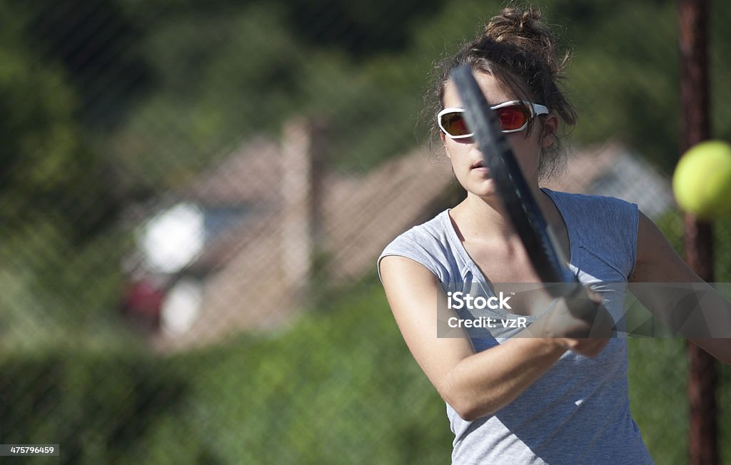 Coup droit-Joueuse de tennis - Photo de Tennis libre de droits