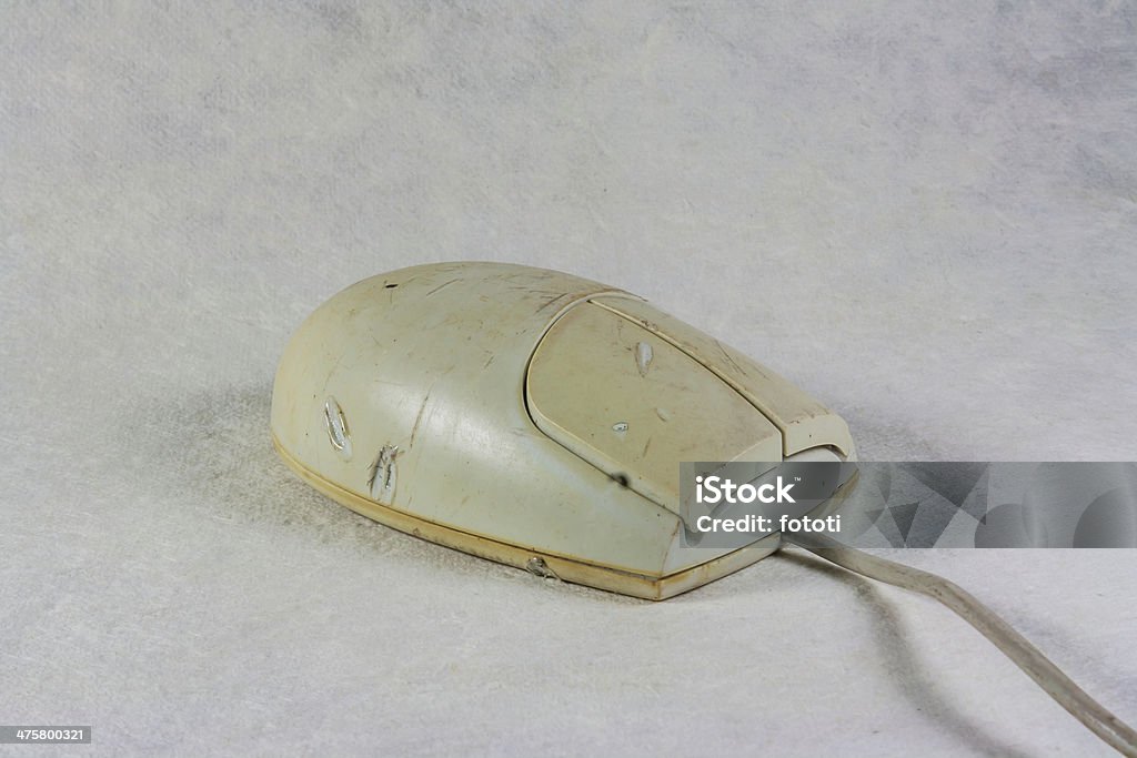 old computer mouse Computer mouse with traces of usage At The Edge Of Stock Photo