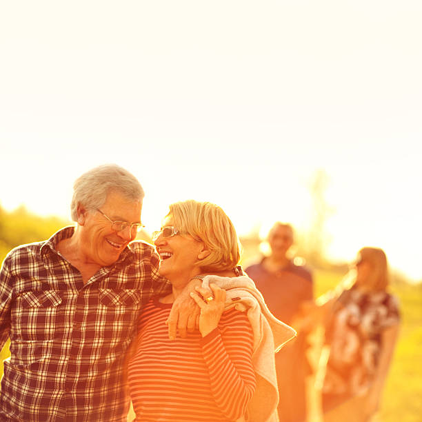 istock Four seniors walking outdoors 475803201