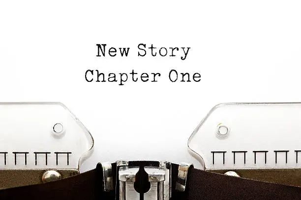 New Story Chapter One printed on a vintage typewriter.