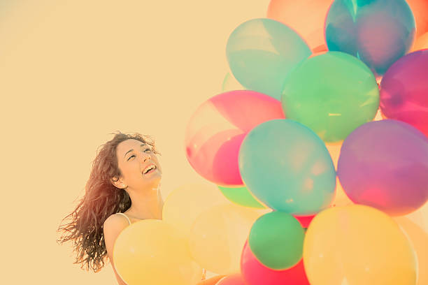 istock woman laughing having fun in vacation holidays warm filter appli 475803684