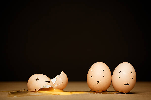 Cute Eggs Stories on Dark Background, Dead & Scared stock photo