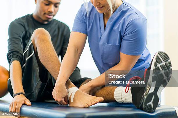 Physical Therapy Stock Photo - Download Image Now - Physical Injury, Ankle, Athlete