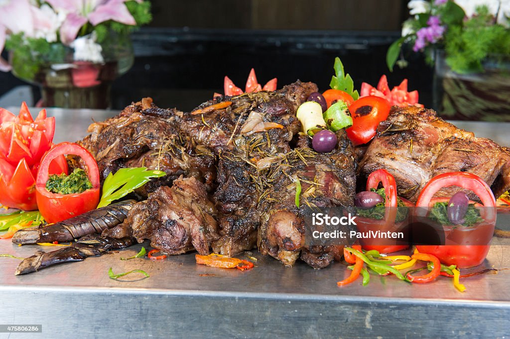 Roast beef at a restaurant buffet carvery Closeup detail of roast beef on display at a hotel restaurant carvery 2015 Stock Photo