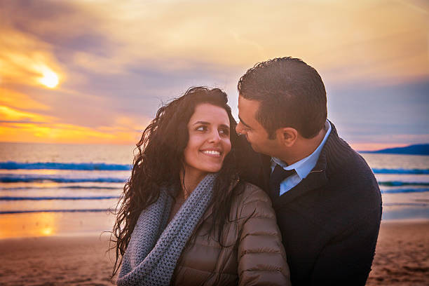 istock Loving couple at sunset 475806397
