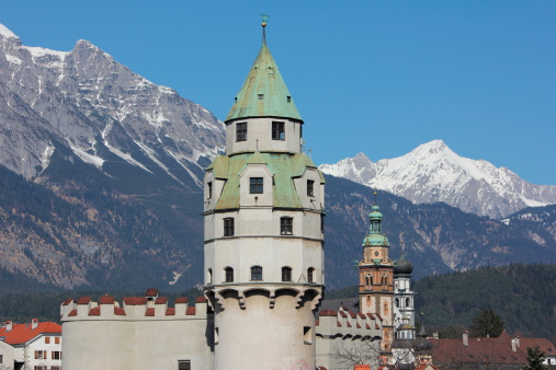 Mint Tower of Burg Hasegg in Hall in Tyrol. The Hasegg Castle is famous for its minting of silver coins, the Thalers. The Thaler, a silver coin, which was used Europe for about four hundred years. The name still lives in currencies like the \