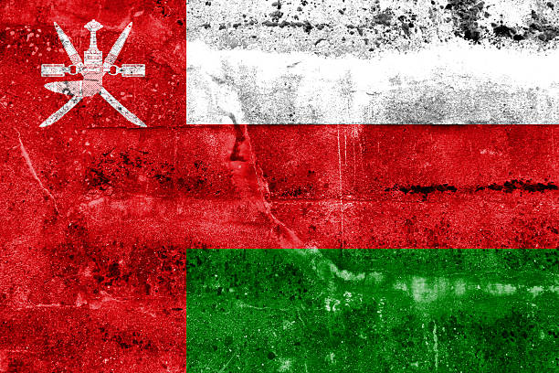 istock Oman Flag painted on grunge wall 475811353