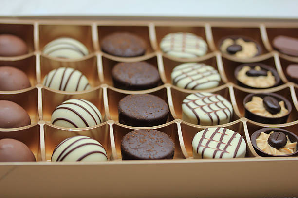 istock Chocolate candies in a box 475814218