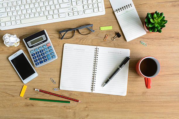 istock office supply and Cup of coffee on desk 475815464