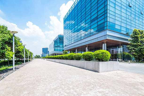 istock Empty road near modern building exterior 475823224