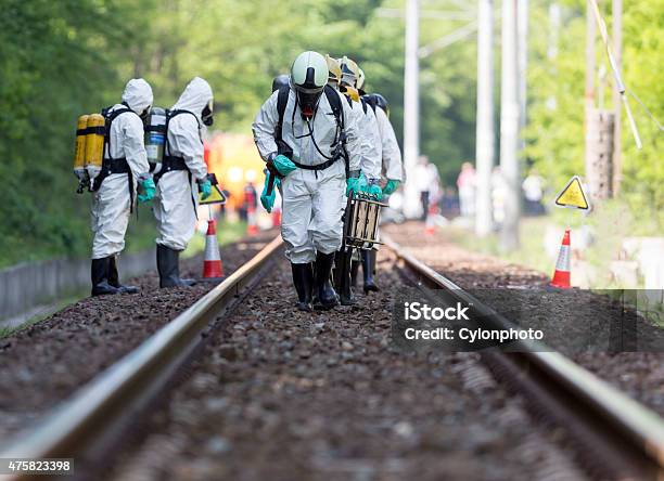 Toxic Chemicals And Acids Emergency Team Stock Photo - Download Image Now - Biochemical Weapon, Train Crash, Chemical