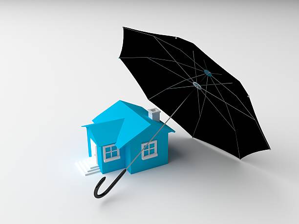 istock Home Insurance Concept of Using the Umbrella 475826184